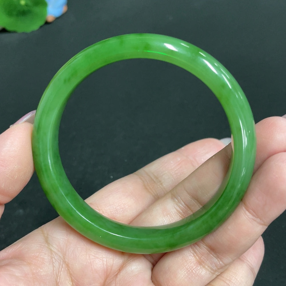 HKHQ Hetian Jade round bracelet, size 59.2, 44.1g, showcasing smooth, polished jade beads in a close-up view.