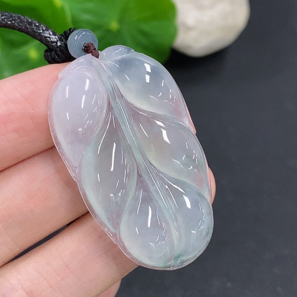 Jadeite leaf pendant necklace by HKHQ featuring a detailed green jade pendant on a delicate chain.