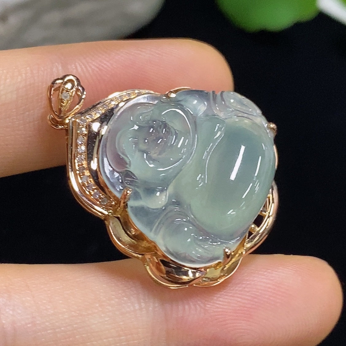 Jadeite Buddha pendant with 18k gold and diamond accents, featuring a carved jade Buddha figure, weight approximately 5.65g.