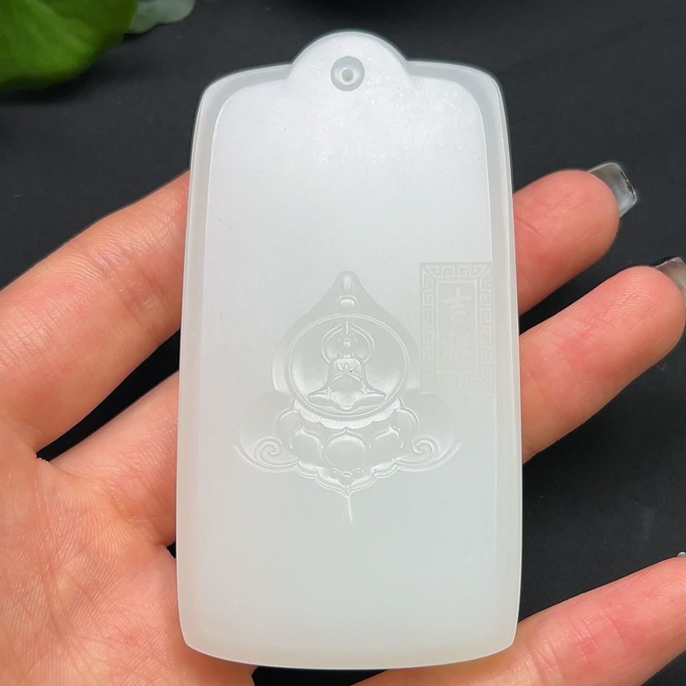Hetian Jade Guanyin pendant necklace by HKHQ, featuring a detailed carved figure, weighs approximately 94.14 grams.