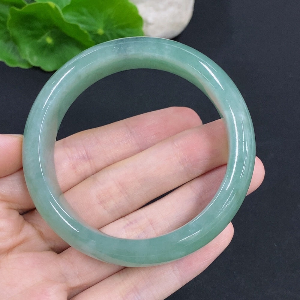 Jadeite round bangle with a smooth finish, weighing approximately 65.9g, size 55.5, crafted by HKHQ.