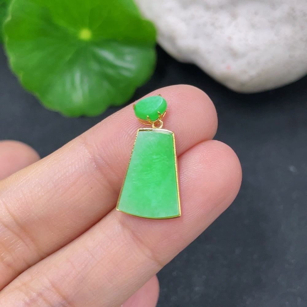 Jadeite plain pendant with 18k gold setting, approximately 1.56g, showcasing smooth, polished jadeite gemstone jewelry.