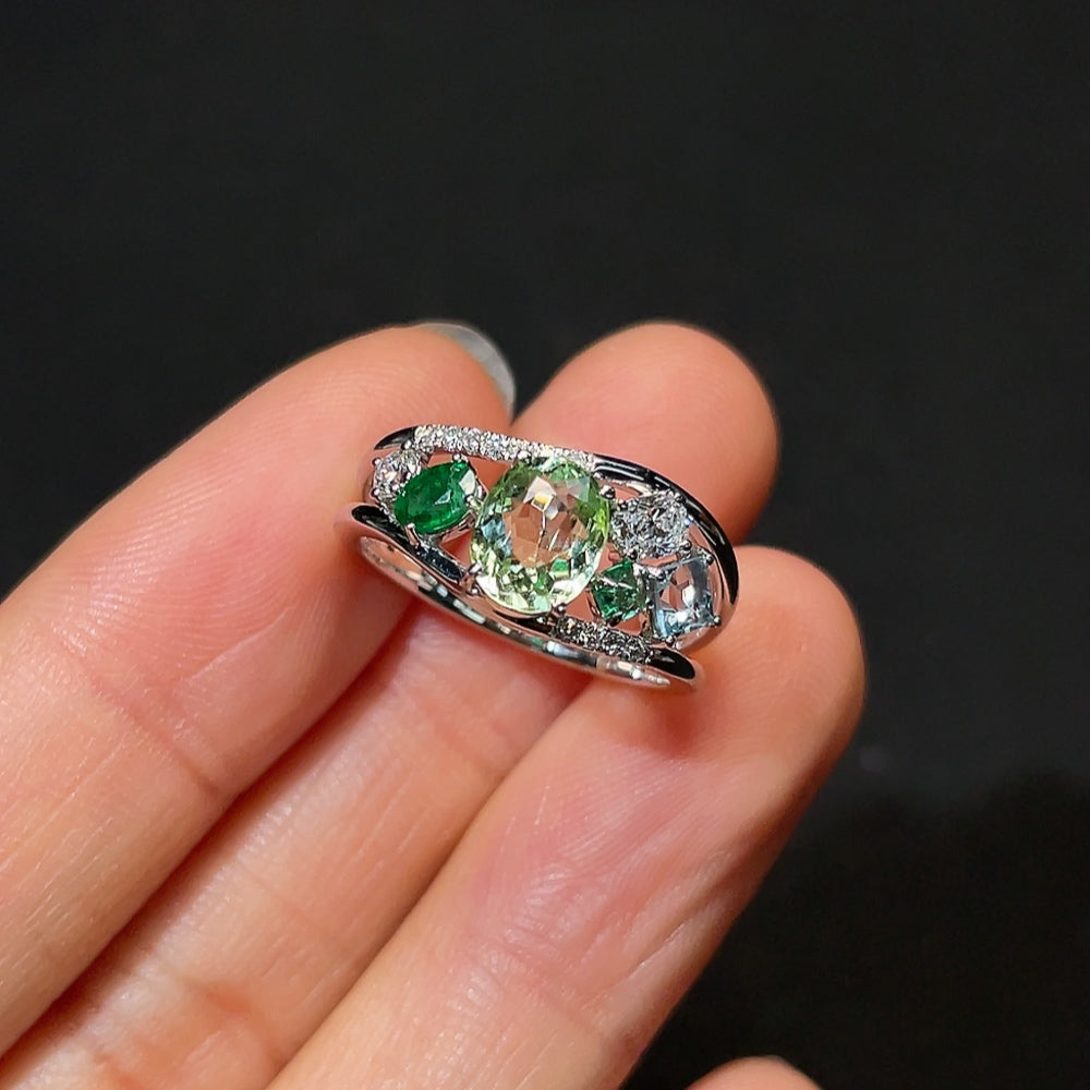 HKHQ tourmaline gemstone ring featuring a large, vibrant tourmaline stone set in a stylish band.