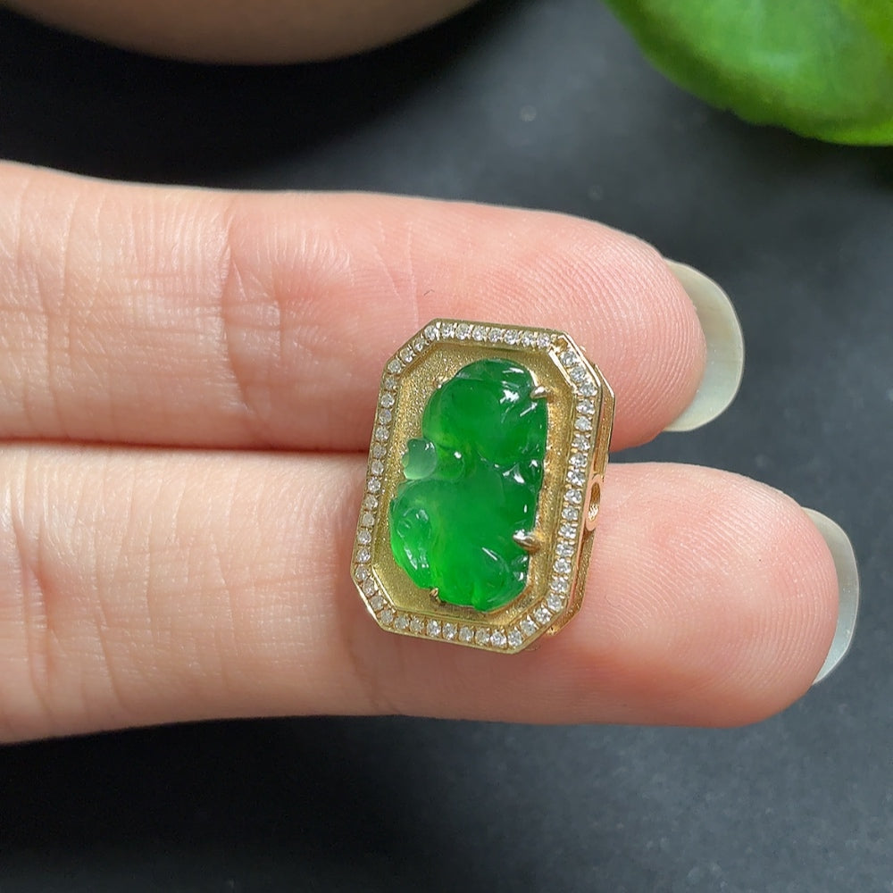 Jadeite inlaid pendant with diamond accents on a necklace, crafted in 18k gold, featuring intricate design and elegant details.