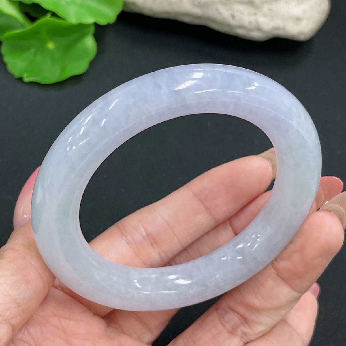 Elegant jadeite round bangle with a 53mm size and 70g weight, crafted by HKHQ, showcasing smooth, polished jade jewelry.