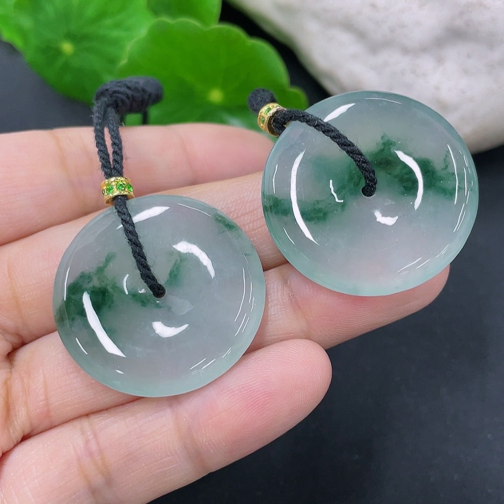 Jadeite pendant with peace buckle design, suspected gold-plated, showcasing a polished green jade stone from HKHQ.