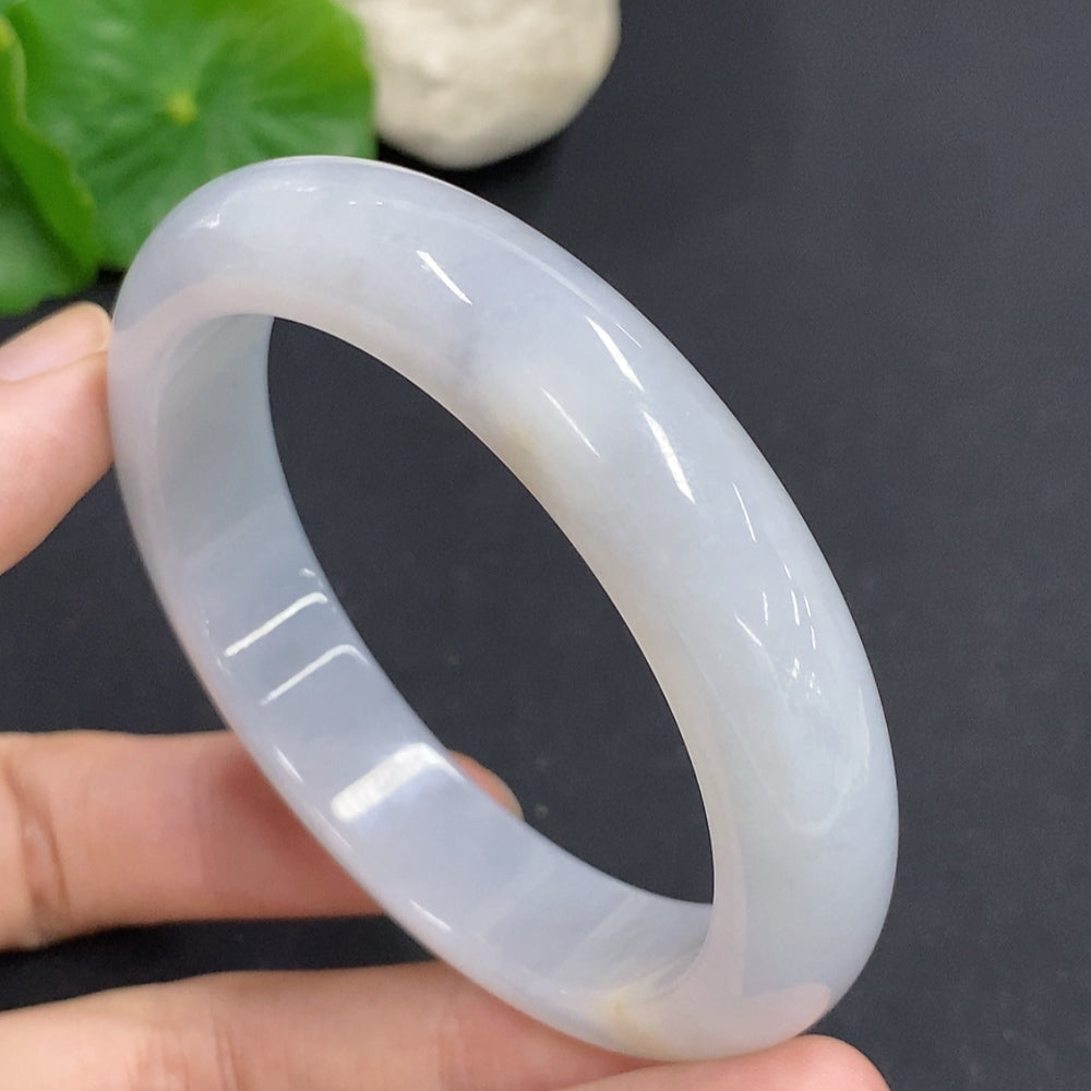 HKHQ jadeite round bangle, size 54, polished green bracelet with smooth surface and natural jadeite appearance.