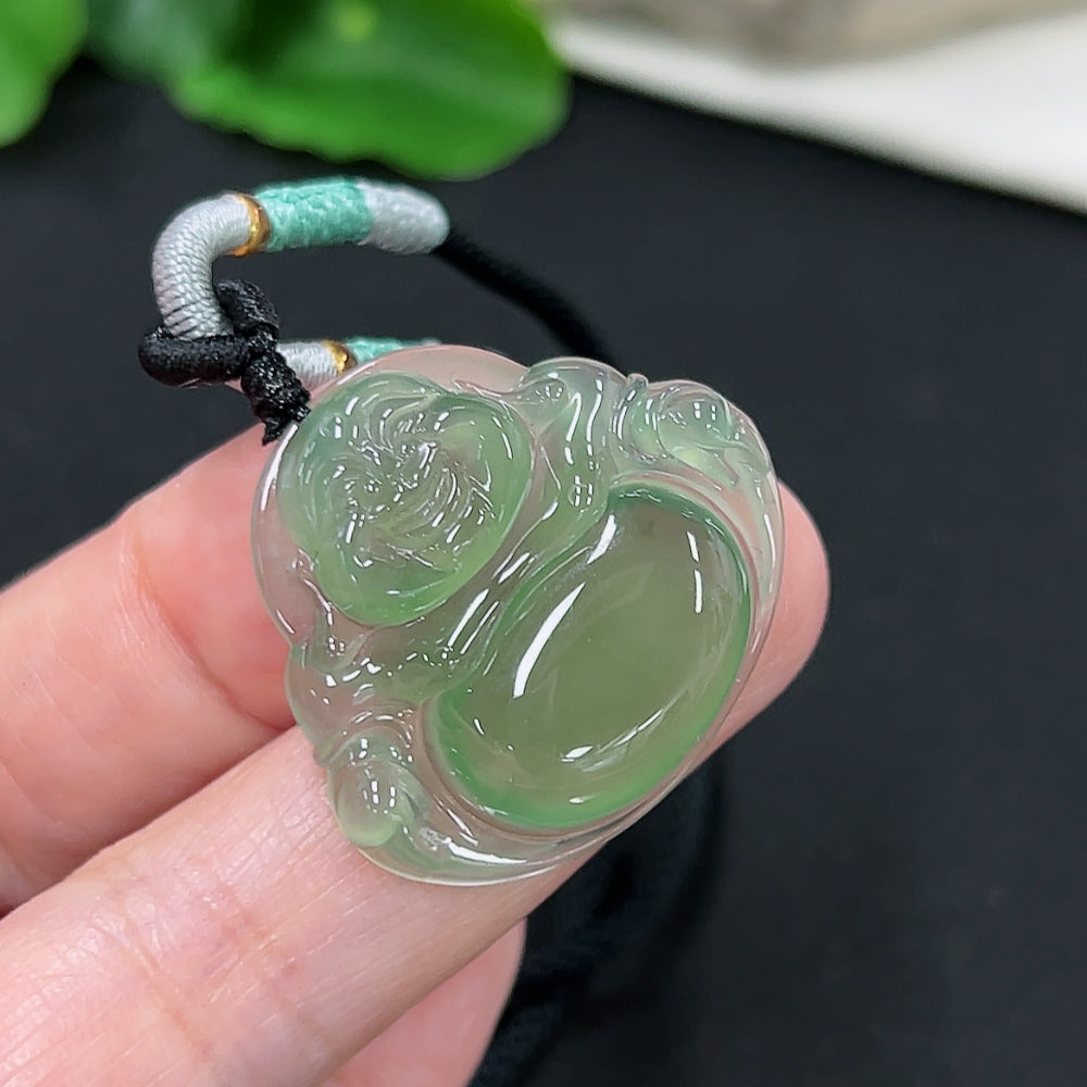 Jadeite Buddha pendant with carved Buddha figure, attached to a rope, weighing approximately 9.2g, from HKHQ.
