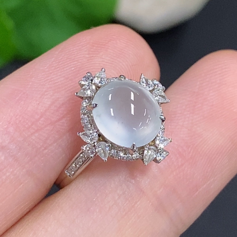 Jadeite cabochon ring with 18k gold and diamond accents, size 10, by HKHQ, featuring a polished jadeite stone and elegant gold band.
