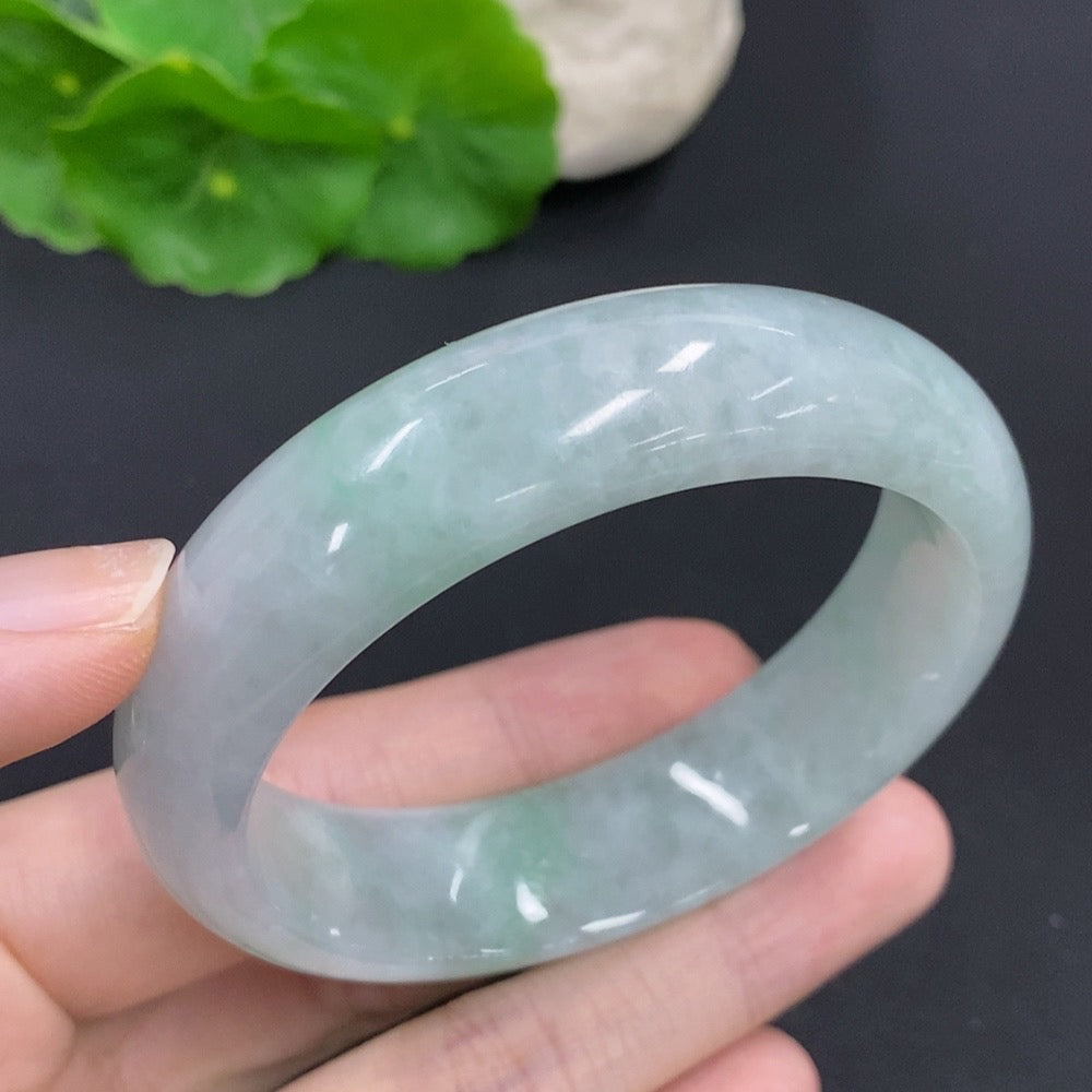 Jadeite round bangle with a total weight of 64.6g, size 54.5, showcasing smooth, polished jadeite jewelry with a glossy finish.