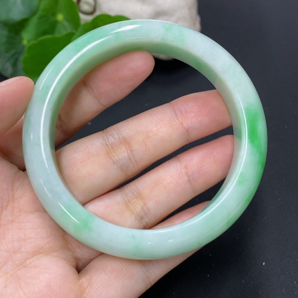 Jadeite round bracelet with size 58 and total weight of 69.2g, featuring polished green jade beads on a HKHQ bracelet.
