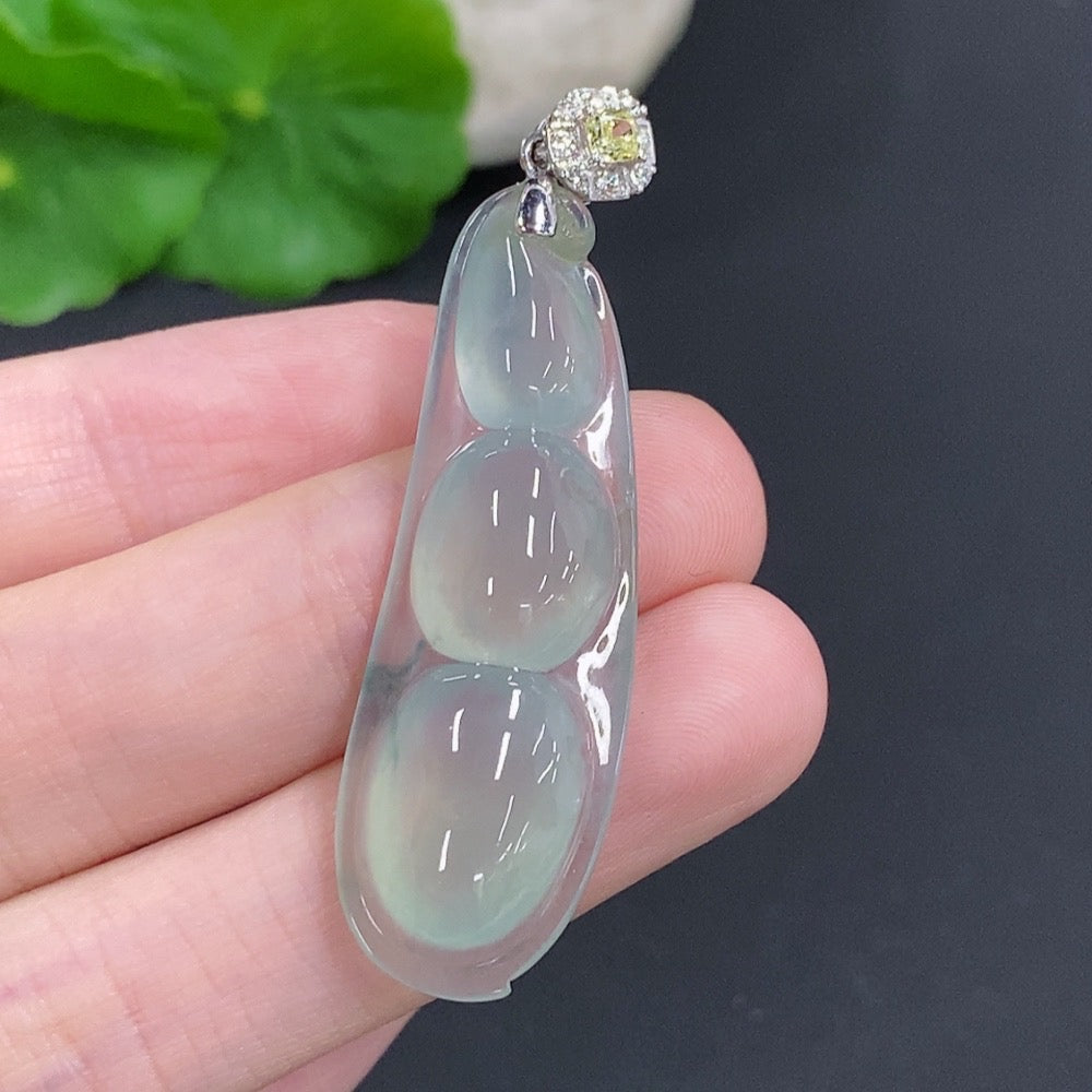 Jadeite bean pendant with 18K gold and colorless diamonds, crafted by HKHQ, showcasing a smooth, polished jade stone on a gold chain.