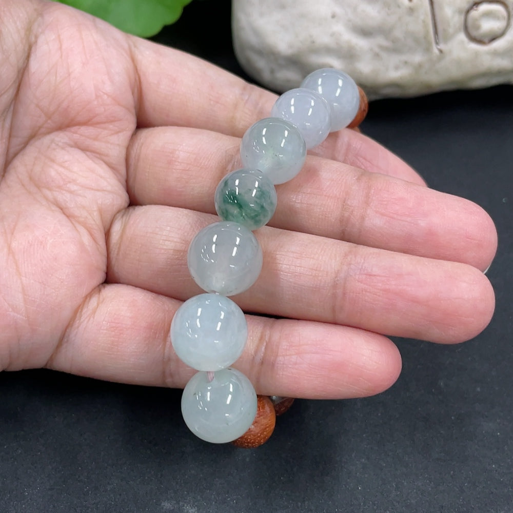 Jadeite and wood bead bracelet with 12.2mm beads, HKHQ brand, showcasing green jade and wooden accents on a light background.
