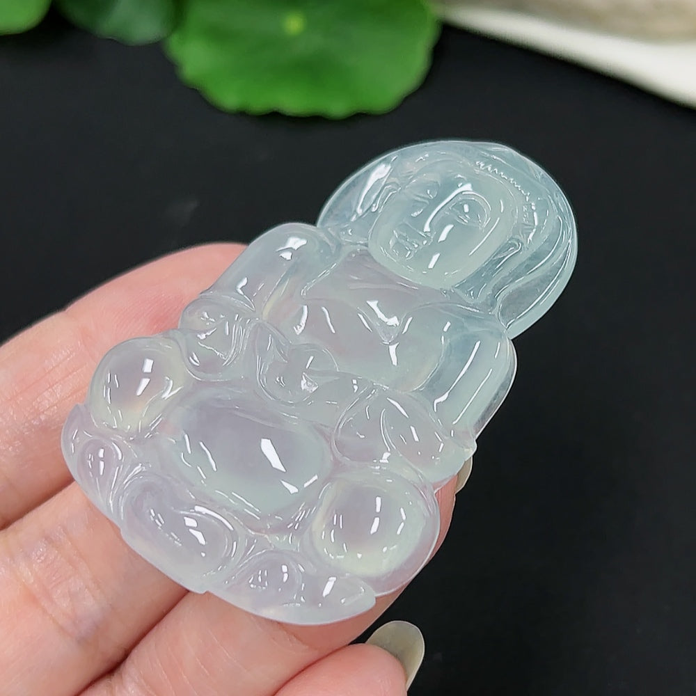 Jadeite Guanyin pendant from HKHQ with intricate carving, weighs approximately 21.1g, showcasing smooth green jade details.