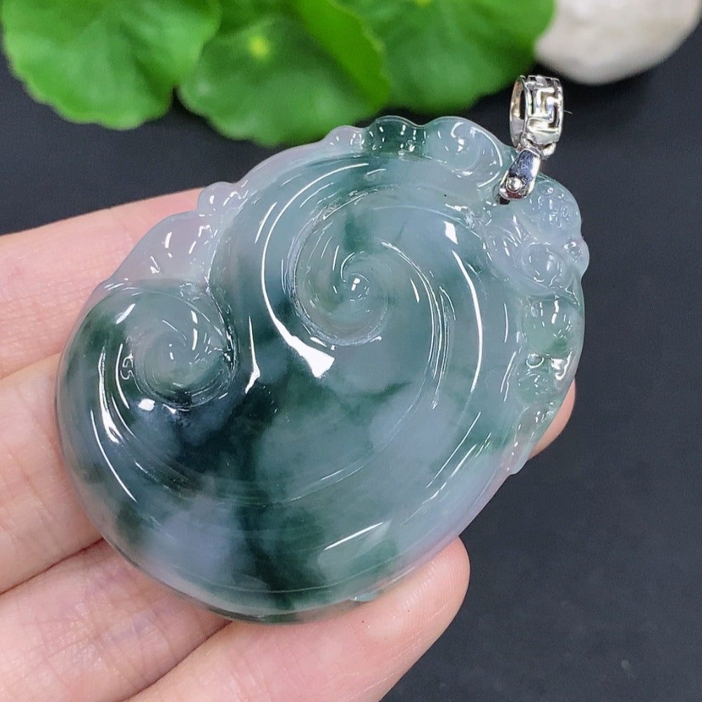 Damaged Jadeite Ruyi pendant with 18K gold clasp, HKHQ, showing detailed jade texture and gold accents on a white background.