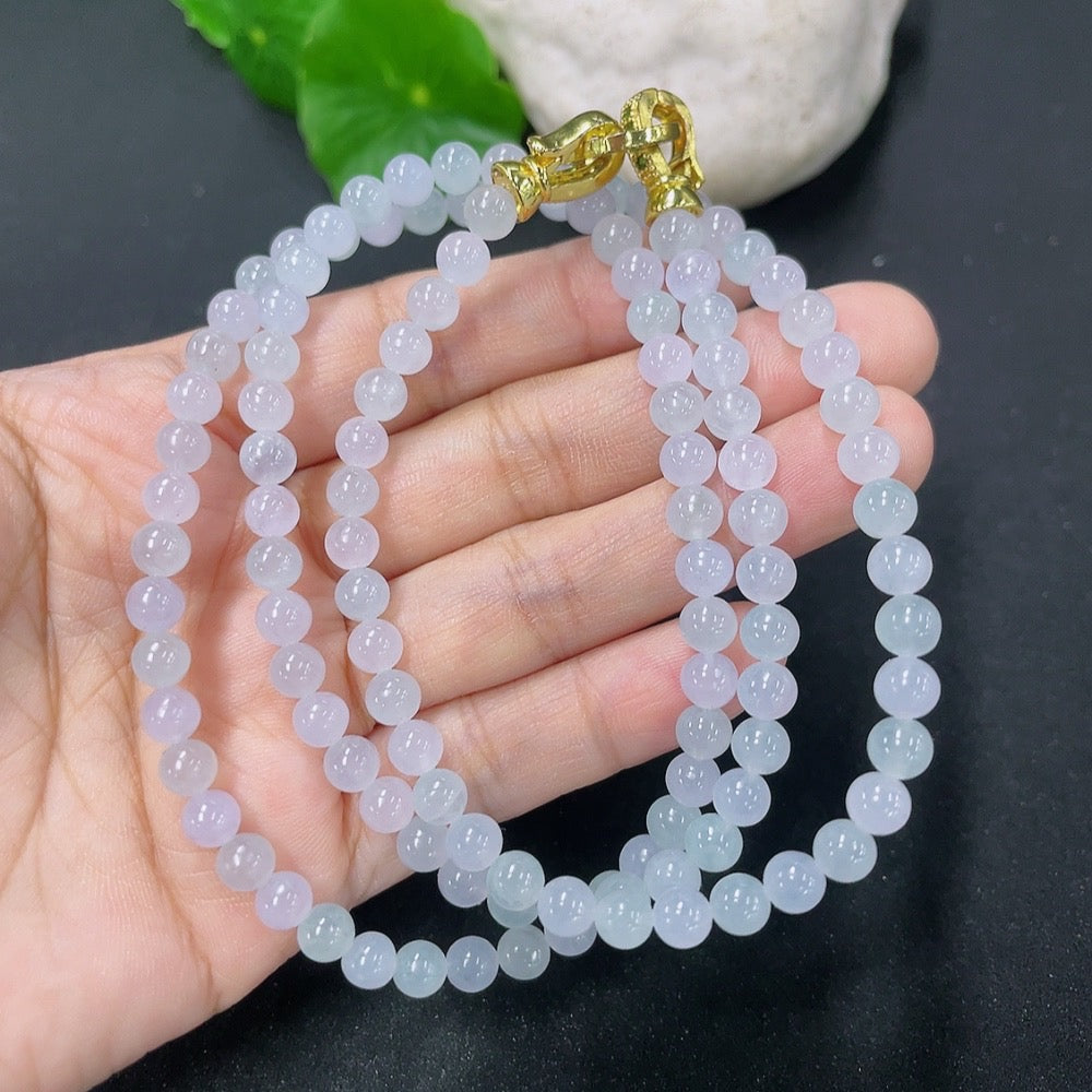 HKHQ jadeite bead necklace with 5.2mm beads, approximately 32.1g, showcasing smooth, polished jade stones.