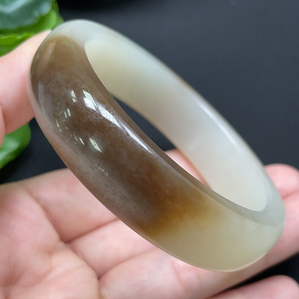 Hetian jade round bracelet with mineral components, 55.8mm diameter, approximately 66.44g, featuring smooth jade beads and natural mineral accents.