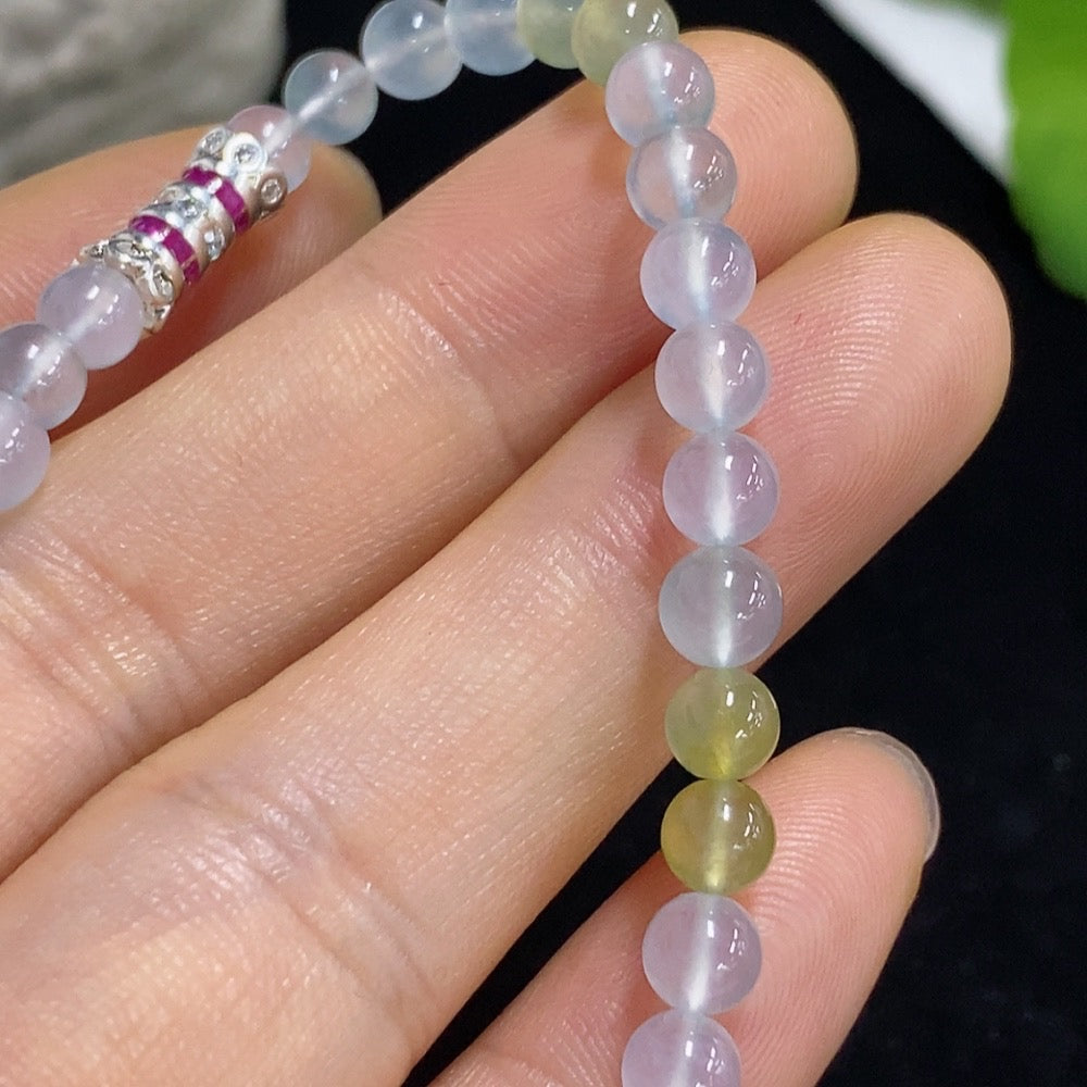HKHQ jadeite bracelet with 4.8mm beads, non-gold, featuring smooth, polished green jade stones, total weight 8.22g.