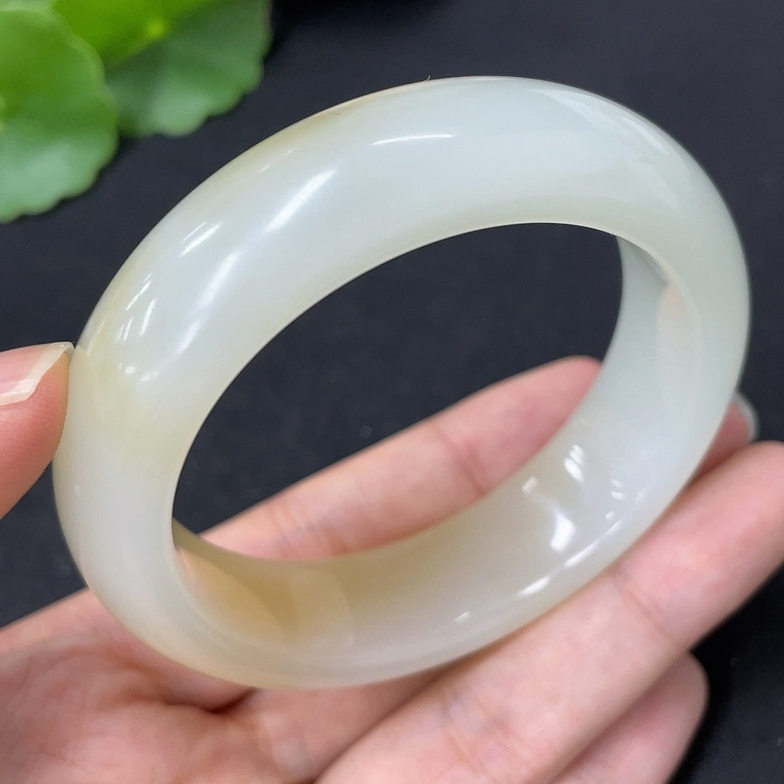 Hetian jade round bracelet with 54.1mm size and 70.3g weight, featuring smooth, polished jade beads from HKHQ.