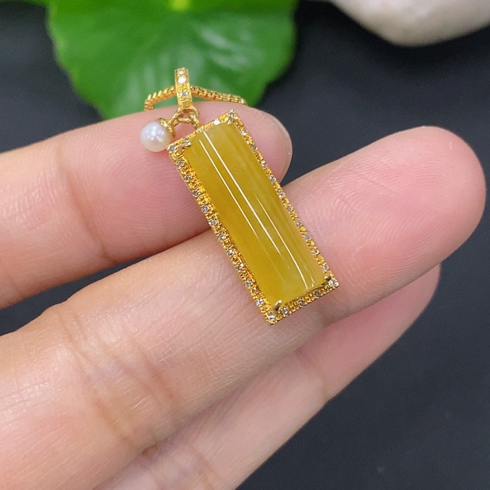 Jadeite plain pendant with 18K gold and diamond accents, on a non-gold chain, featuring non-grade A beads, by HKHQ.