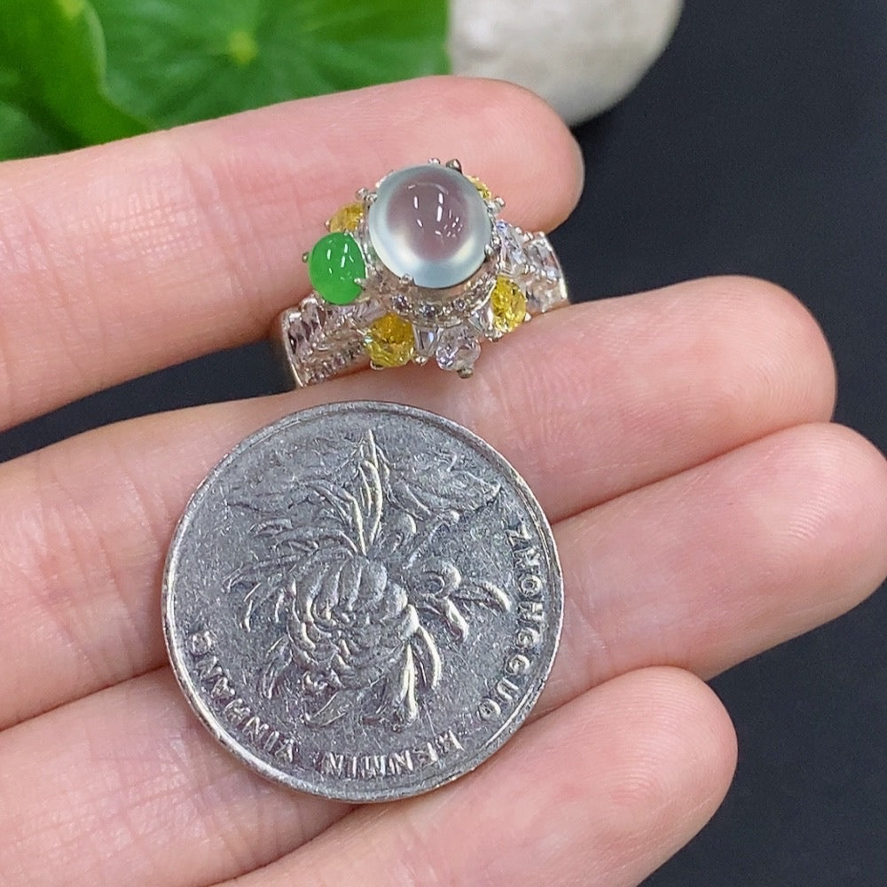 Set of jadeite cabochons in various shapes and sizes, from HKHQ, showcasing rich green jade without gold embellishments.