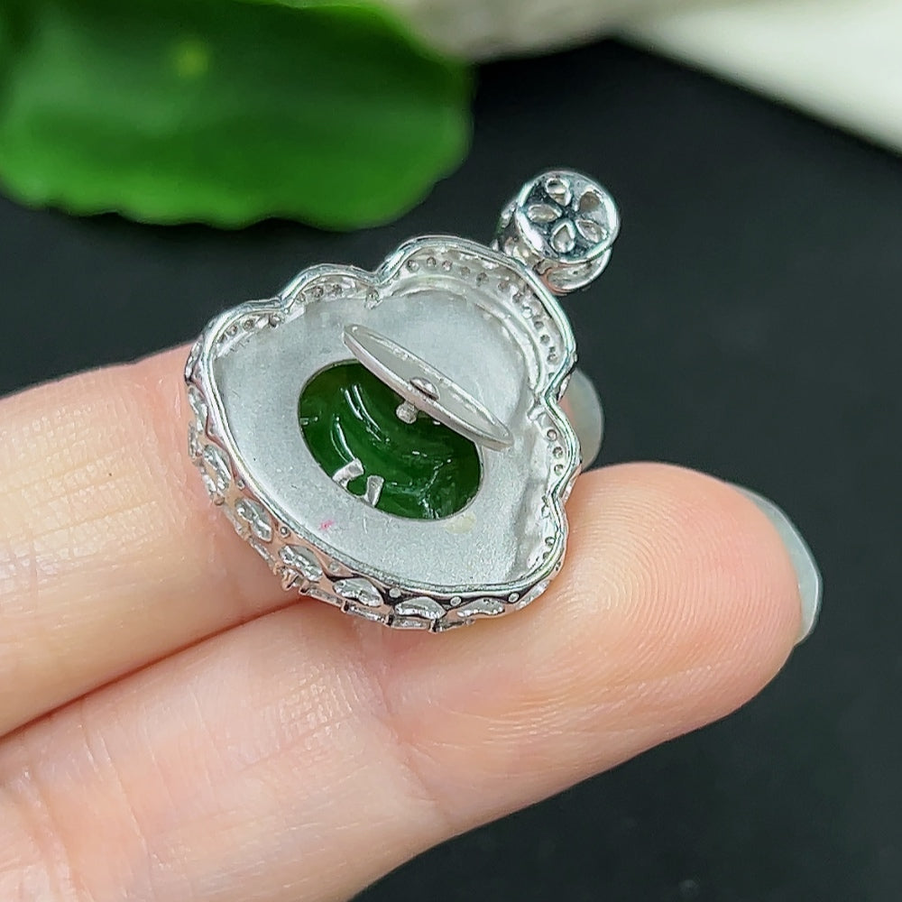Jadeite Buddha pendant necklace in 18K gold with diamond accents, featuring a detailed Buddha figure and elegant chain.