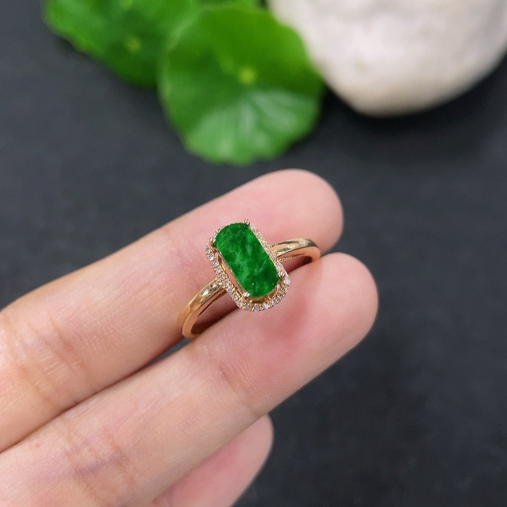 Jadeite and diamond ring in 18k gold with size 14, featuring intricate gemstone details and a polished gold band.