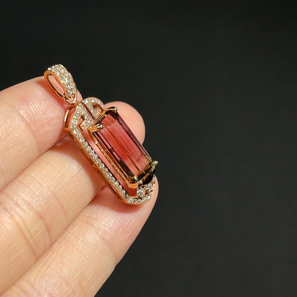 Tourmaline pendant with 18K gold and diamond accents, featuring a colorful gemstone design, weighing approximately 3.84g.