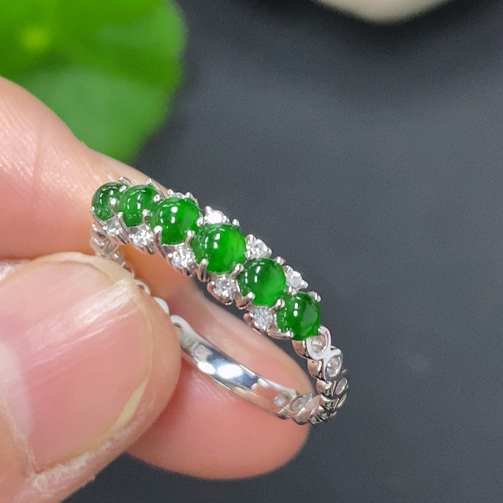 Jadeite cabochon ring with 18K gold band, accented with small diamonds, size 14, from HKHQ.