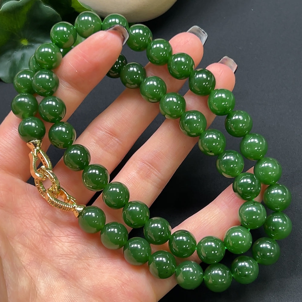 Hetian jade bead necklace by HKHQ featuring 9.6mm non-gold beads, approximately 68.36g, shown on a plain background.
