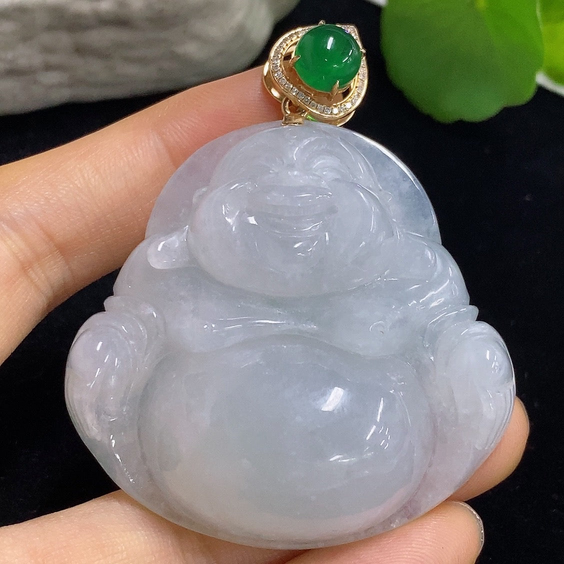 Jadeite Buddha pendant necklace with 18K gold and diamond accents, featuring a green cabochon jadeite stone, crafted by HKHQ.