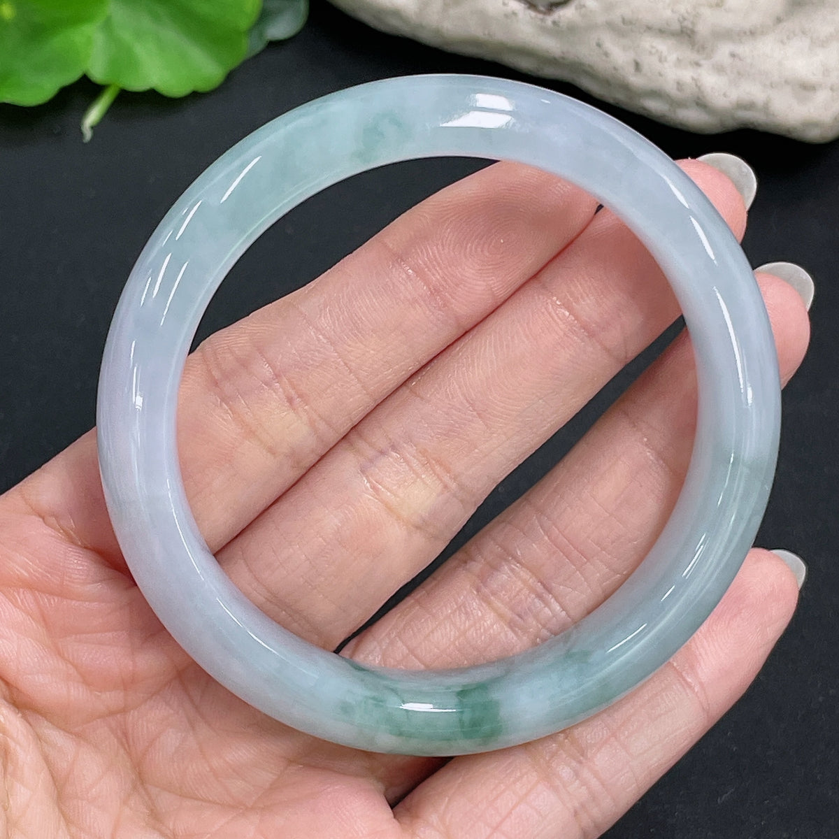 Jadeite round bangle with a total weight of 54.6g and size 56.3, featuring smooth green jade surface, by HKHQ.