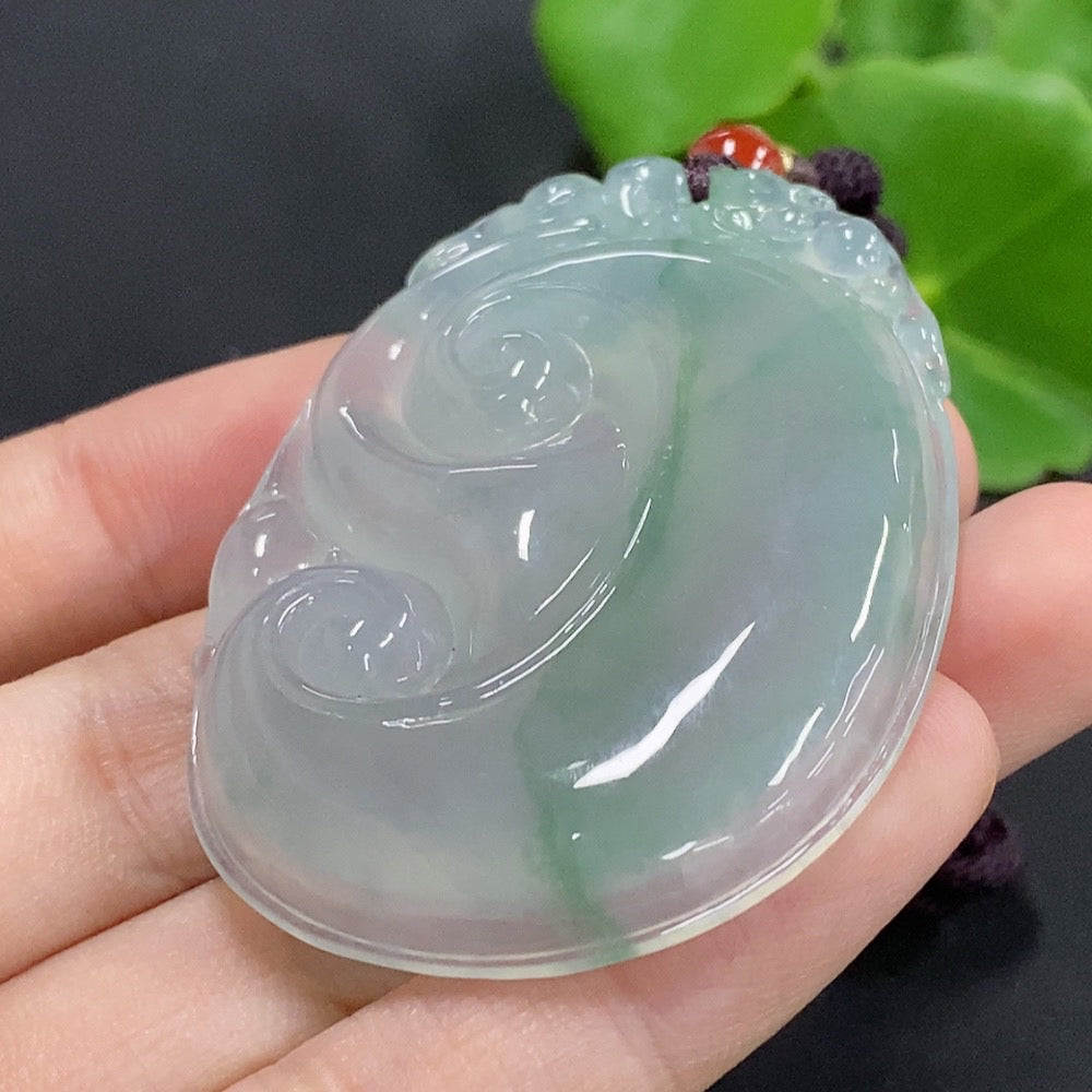 Jadeite Ruyi pendant necklace from HKHQ featuring a polished, intricate jadeite pendant on a delicate cord.