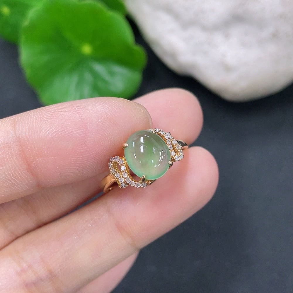 Jadeite inlaid 18K gold ring with diamond accents, handcrafted jewelry by HKHQ featuring polished green jade and sparkling diamonds.