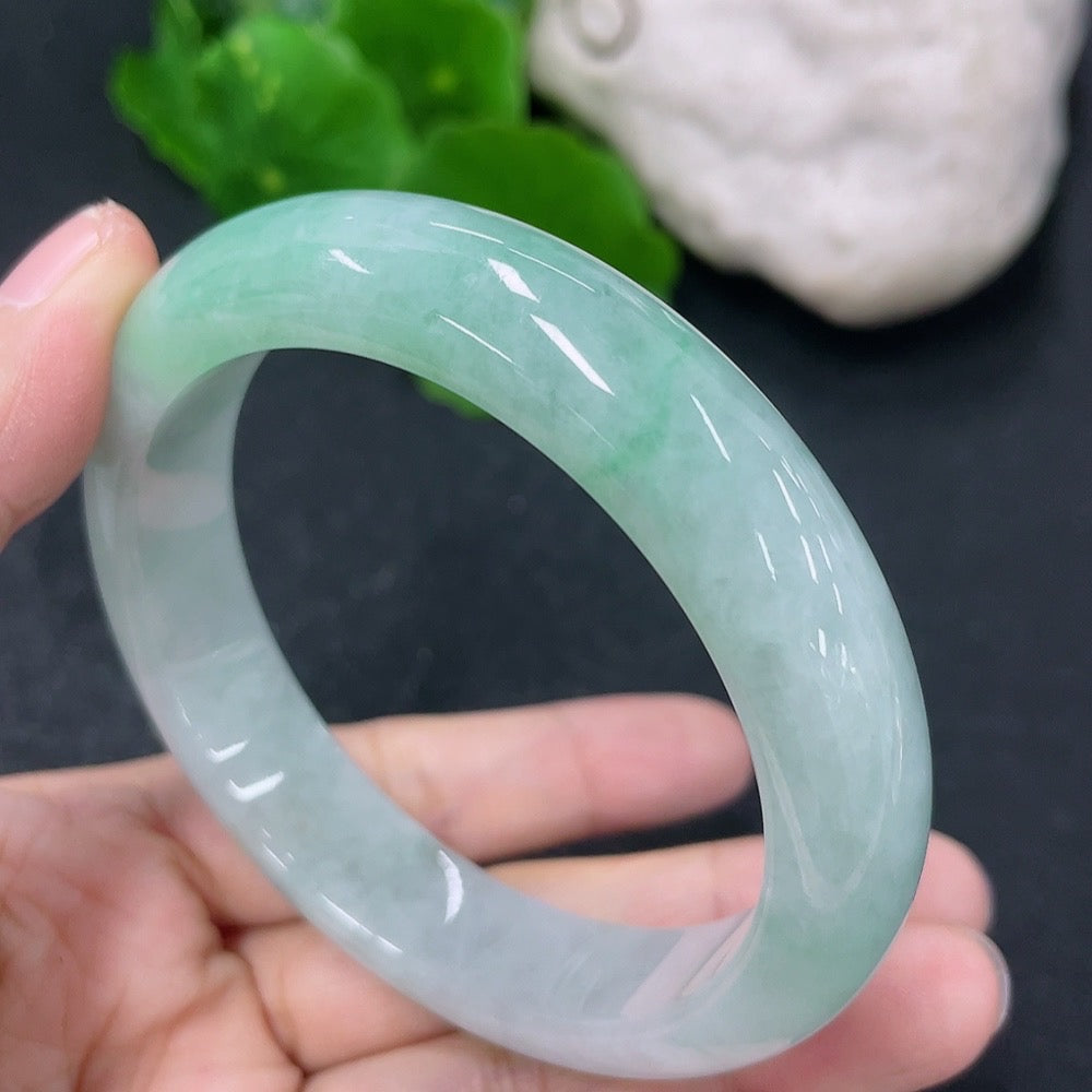 Jadeite round bracelet with 55.2mm diameter and 56.52g weight, crafted from green jade by HKHQ.