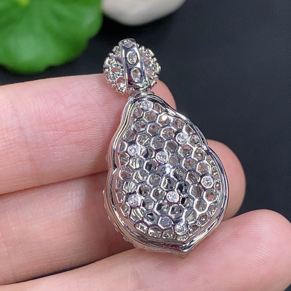 Jadeite gourd pendant with 18k gold and diamond accents, displayed on a necklace chain, weight approx. 7.2g.