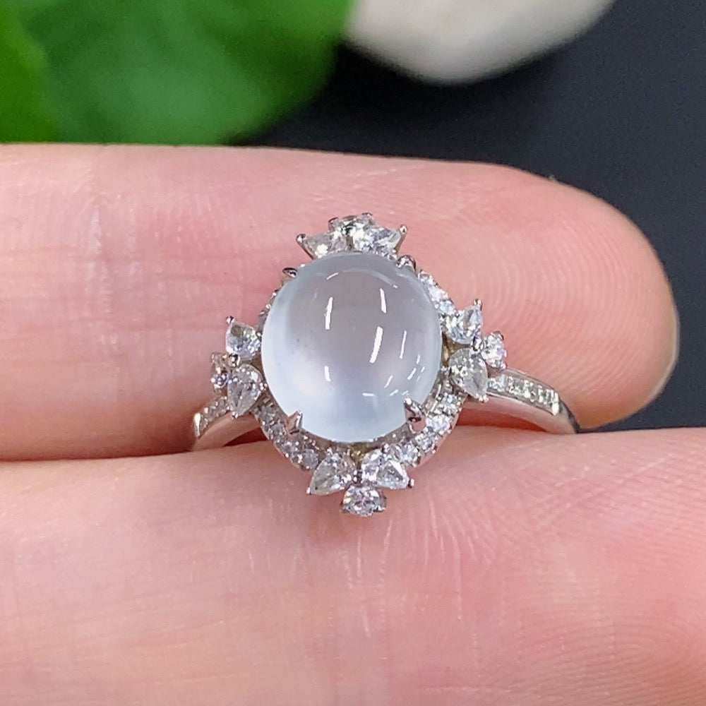 HKHQ jadeite cabochon ring with 18k gold and diamond accents, size 10, featuring a polished green gemstone in a gold setting