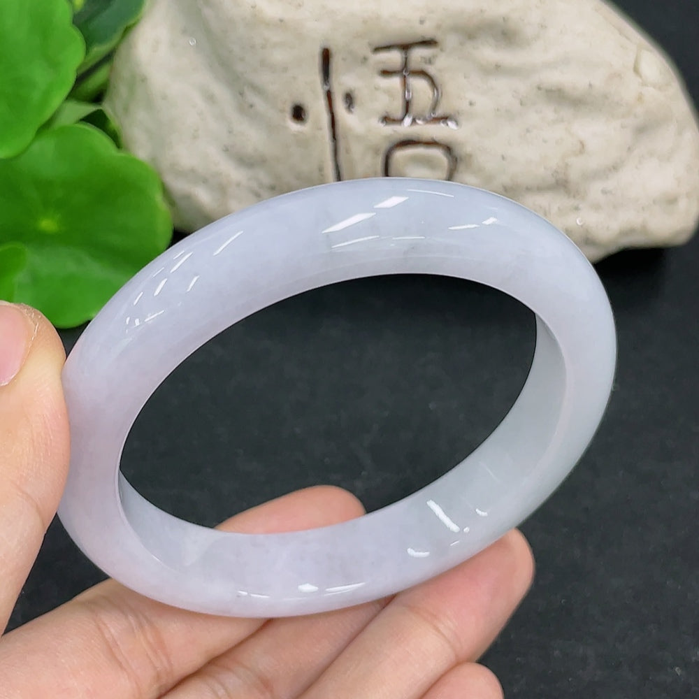 HKHQ jadeite round bangle in size 55.8 with a weight of 52.4g, showcasing a smooth, polished green jadeite bracelet.