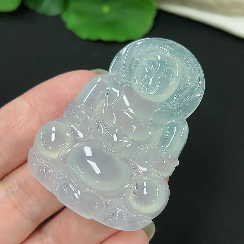 Jadeite Guanyin pendant in natural green jade, approximately 21.1g, crafted by HKHQ, showing detailed carved figure.
