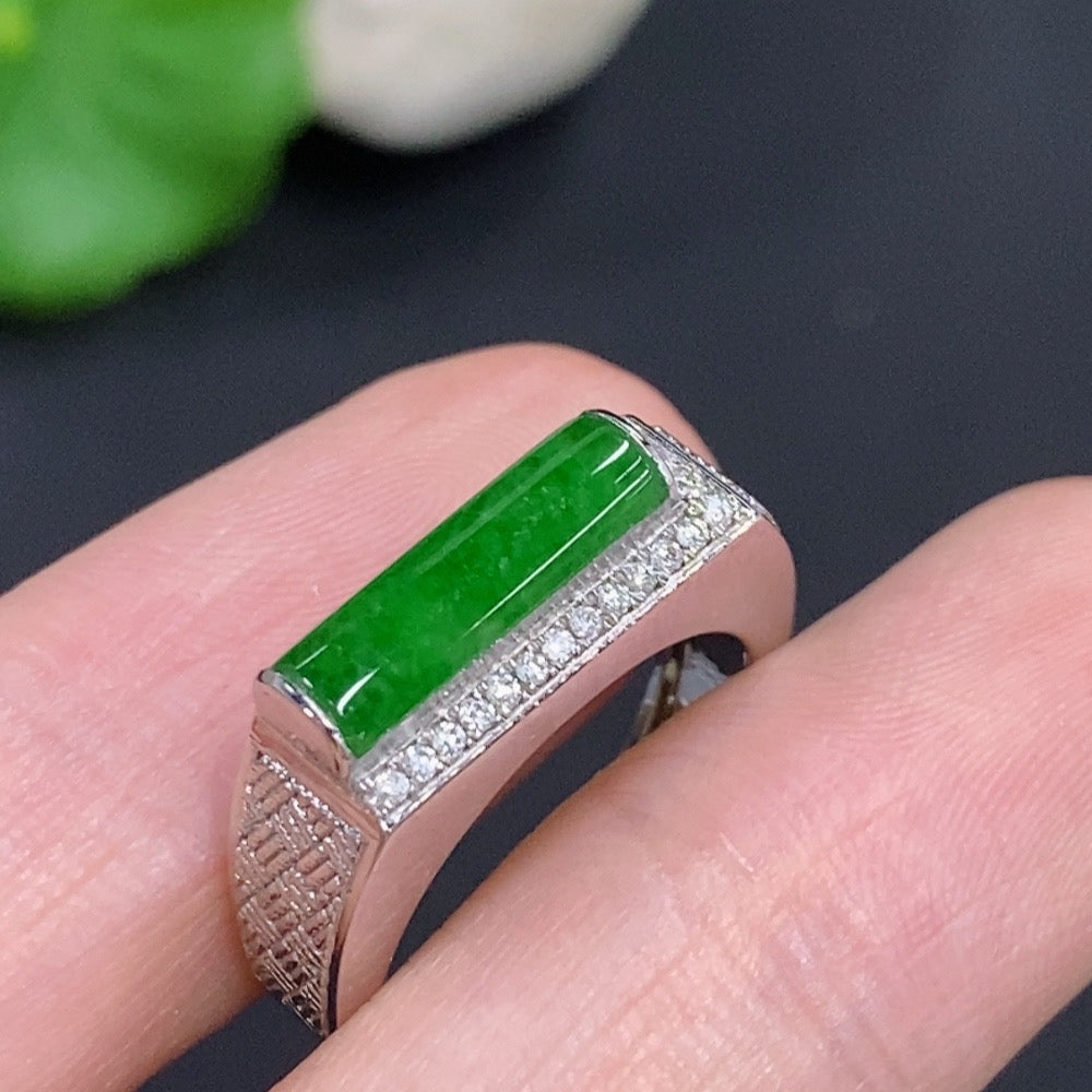 14K gold jadeite cabochon ring with diamond accents, elegant jewelry piece featuring a smooth green jadeite stone and sparkling diamonds.