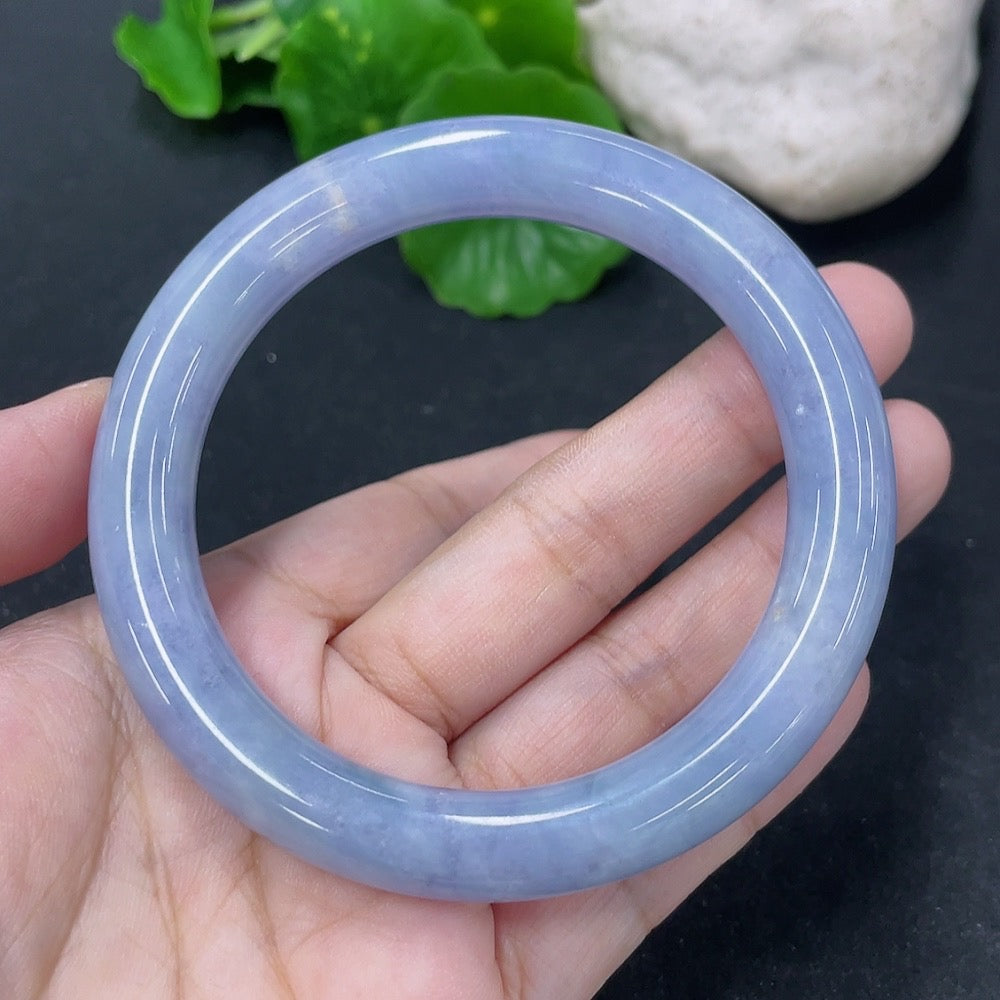 Jadeite round bangle with a 56mm diameter, weighing approximately 54g, featuring smooth, polished jadeite from HKHQ.