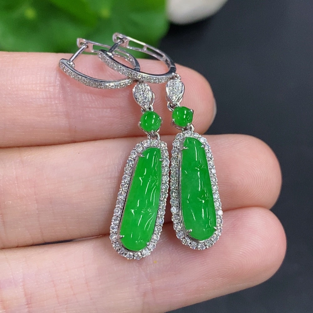 HKHQ jadeite inlaid earrings with diamond accents, 18k gold, showcasing intricate craftsmanship and elegant design.
