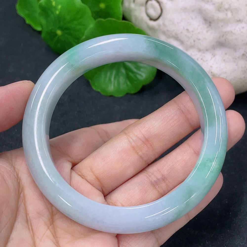 HKHQ jadeite round bracelet with 57.3g weight and size 54.3, featuring smooth, polished jadeite beads in a circular design.