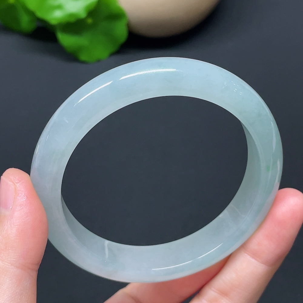 HKHQ jadeite round bangle, size 57.2, weighing 56.76g, showcasing smooth, polished jadeite with a glossy finish.