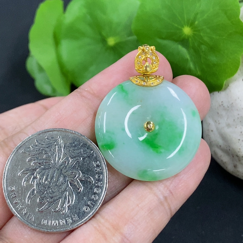 Jadeite peace knot pendant with 18K gold clasp and diamond accents, crafted by HKHQ, weighs approximately 8.55g.