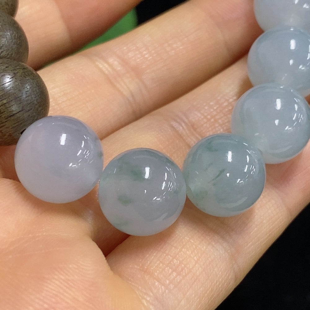 Huiliu certified HKHQ jadeite beads, 12.5mm round, smooth green jade jewelry beads displayed against a neutral background.