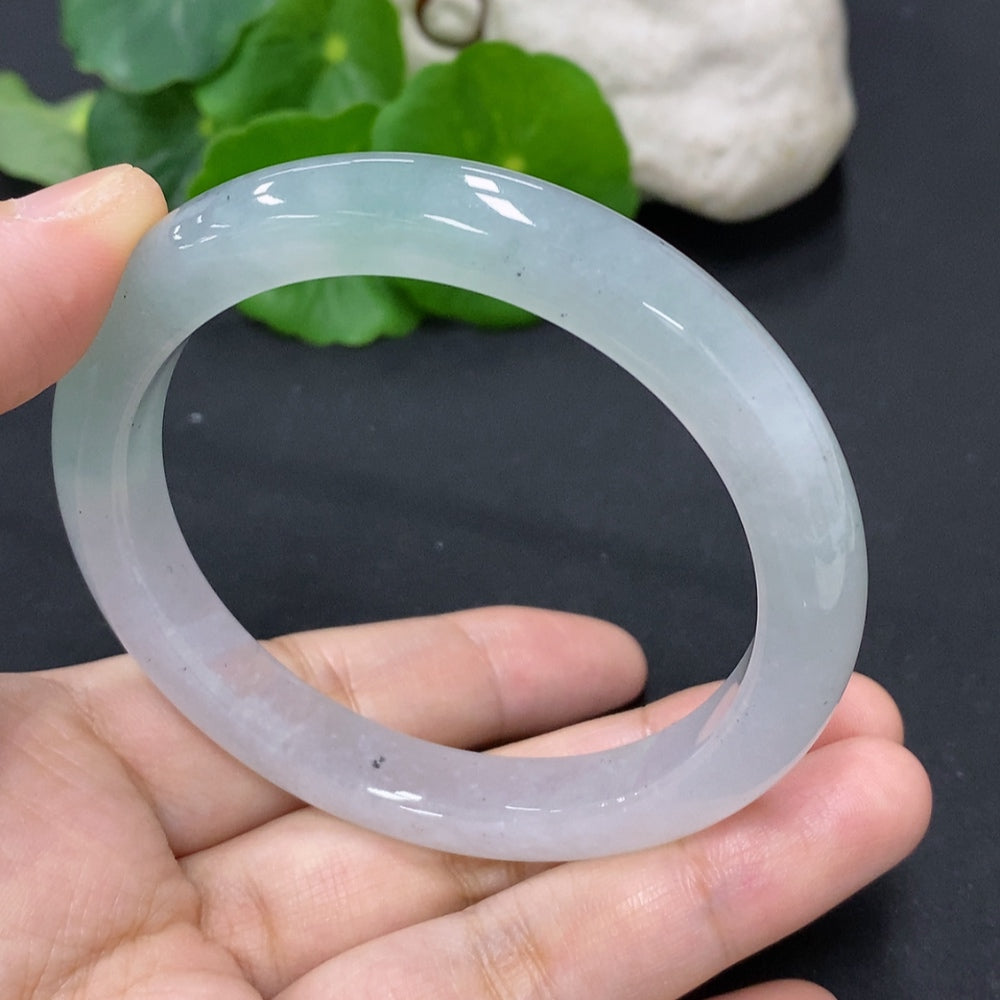 HKHQ jadeite round bangle, size 56.7, 44g, smooth green jade jewelry, close-up of polished jade bangle with natural marbling