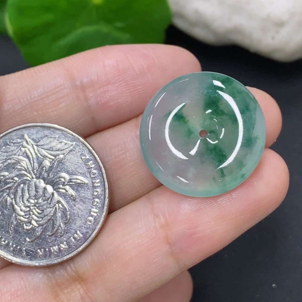 Jadeite Peace Knot pendant from HKHQ, about 4.7g, featuring a smooth, polished jadeite knot design on a neutral background.