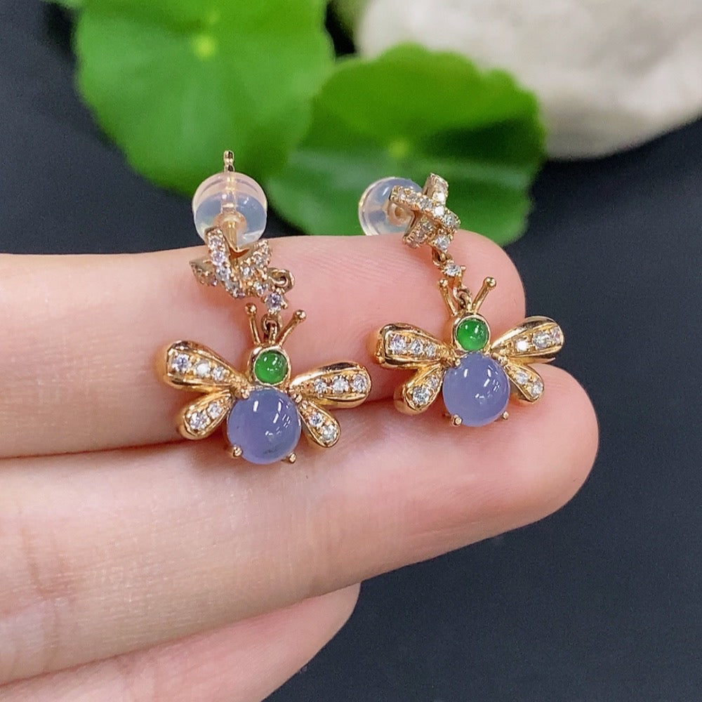 HKHQ jadeite cabochon earrings with 18K gold and diamond accents, showcasing elegant jewelry design.