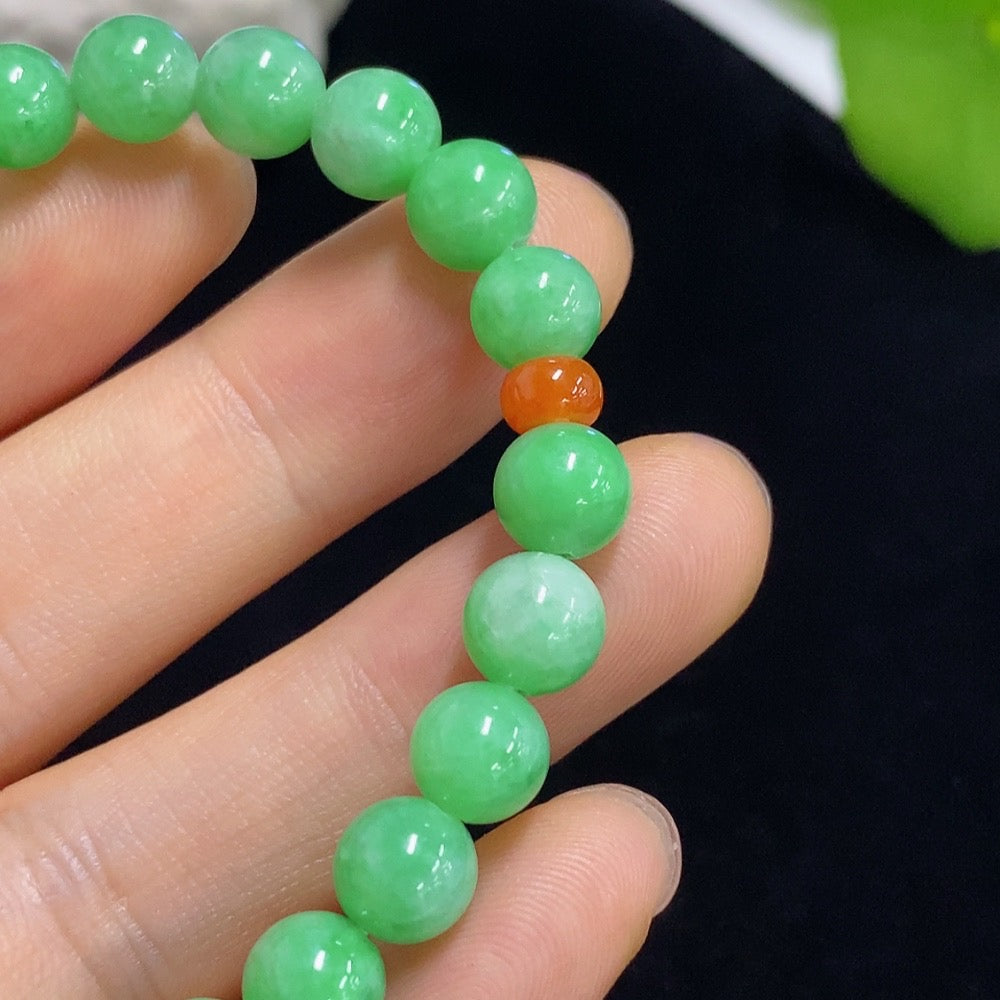 HKHQ jadeite bracelet with red beads, 7.3/5.2mm size, total weight 15.05g, featuring smooth jade stones and vibrant red accents.